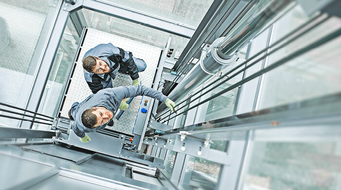 Acquisition of HEBO Aufzugstechnik GmbH Elevator technician in glass elevator
