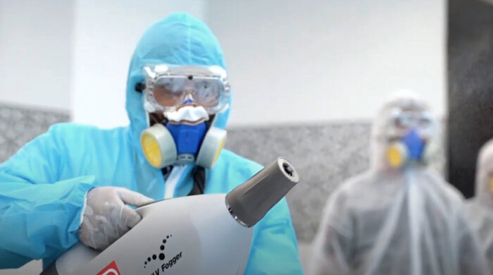 Dussmann fighting Corona Dussmann employee disinfects with cold fogging