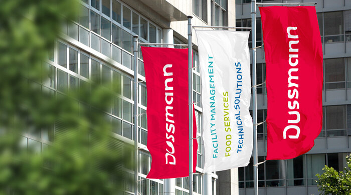 Brand relaunch of the Dussmann brand Flags with new brand logo