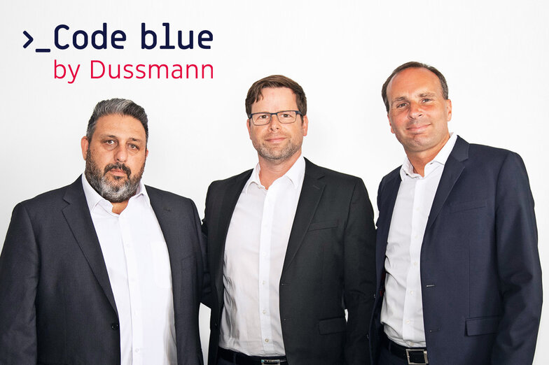 Joint Venture Code Blue by Dussmann Group photo with founder of Code Blue Ltd., Christian Milde, Managing Director Code Blue GmbH and Wolf-Dieter Adlhoch, CEO of Dussmann Group